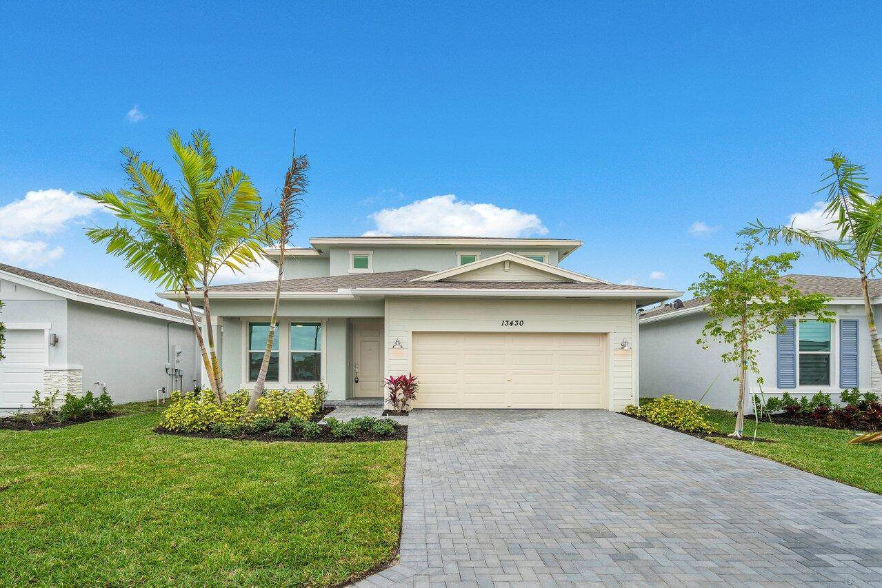 Be the first to live in this stunningly beautiful brand new home in an active 55 community minutes from downtown Delray.