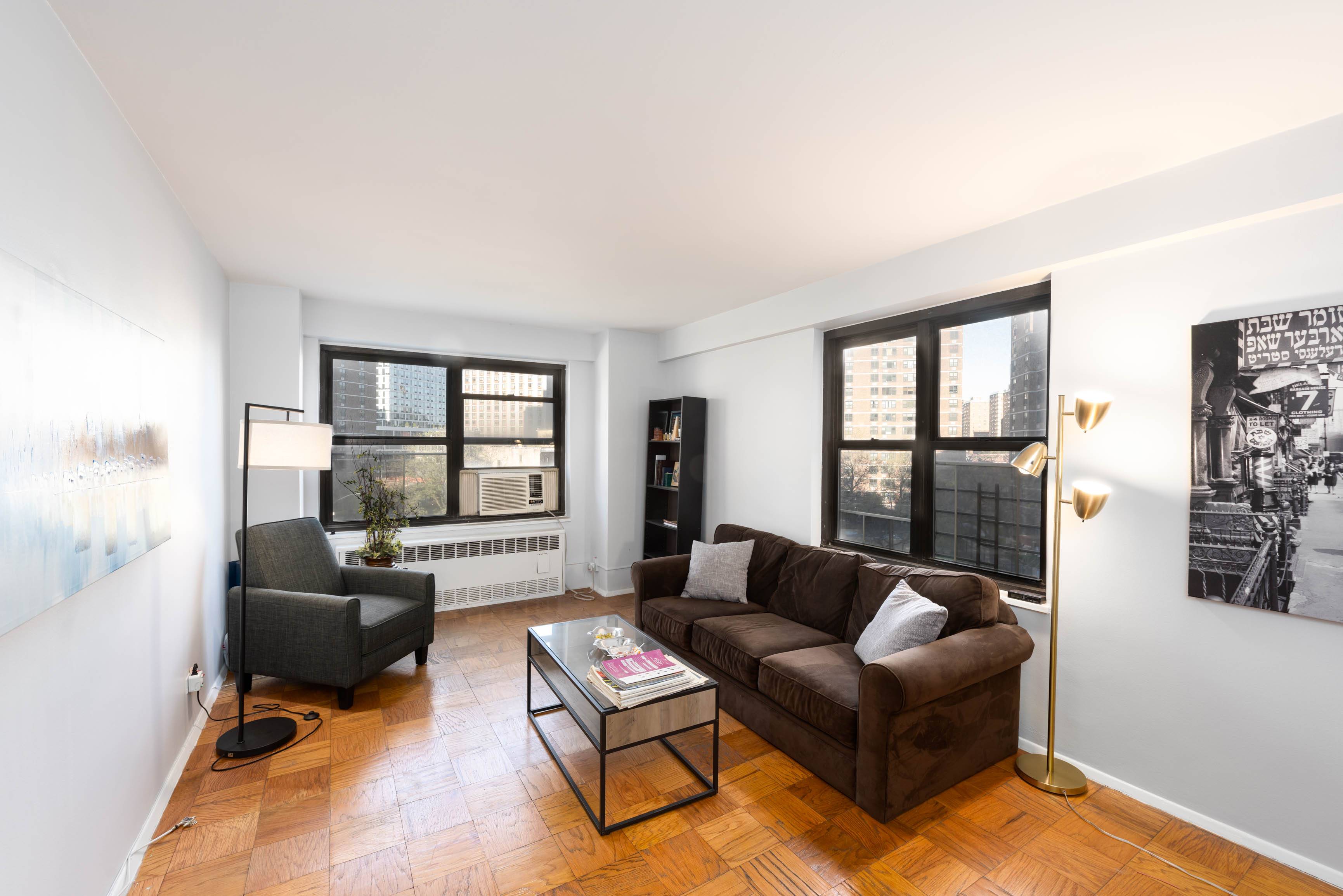 This large amp ; sunny Seward Park apartment highlights a generously sized living room with double exposures north amp ; west overlooking the co ops beautifully manicured, private park.
