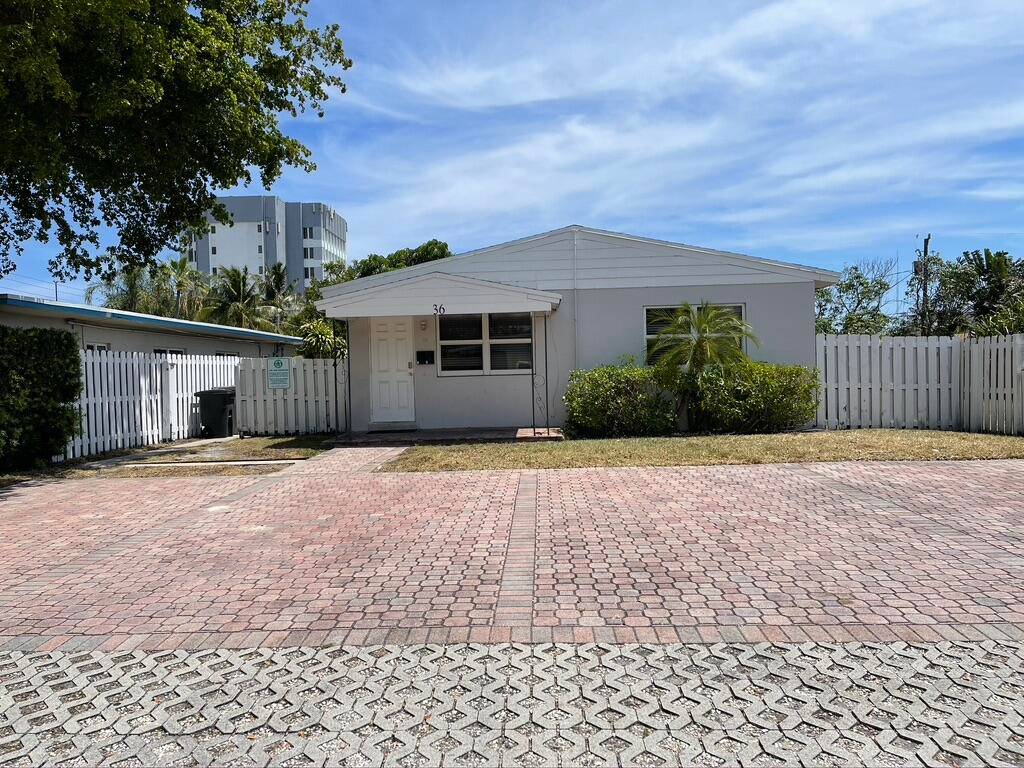 Rare opportunity to own a large duplex less than a block from Atlantic Blvd and less than a mile to the beach.