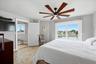 Primary bedroom with private balcony