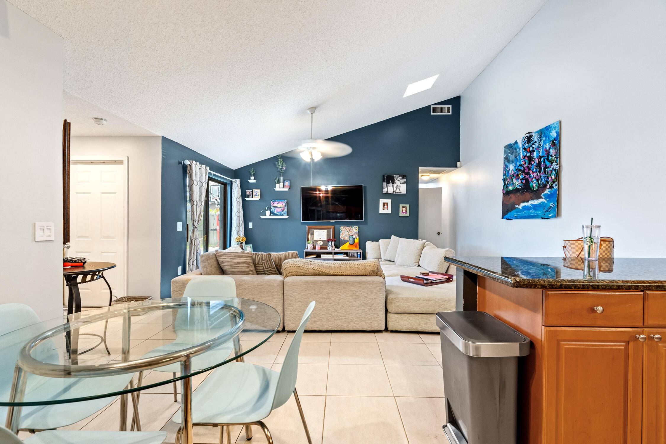 Gorgeous three bedroom, three and a half bathroom townhome featuring a one car garage, driveway, an assigned parking spot, and guest parking.