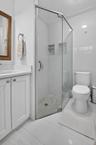 PRIMARY ENSUITE BATHROOM: water saving eco friendly TOTO toilet and large shower