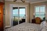 Primary bedroom has iprivate balcony entrance with fantastic beach view.