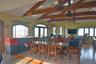 Dining space featuring a water view and wood finished floors