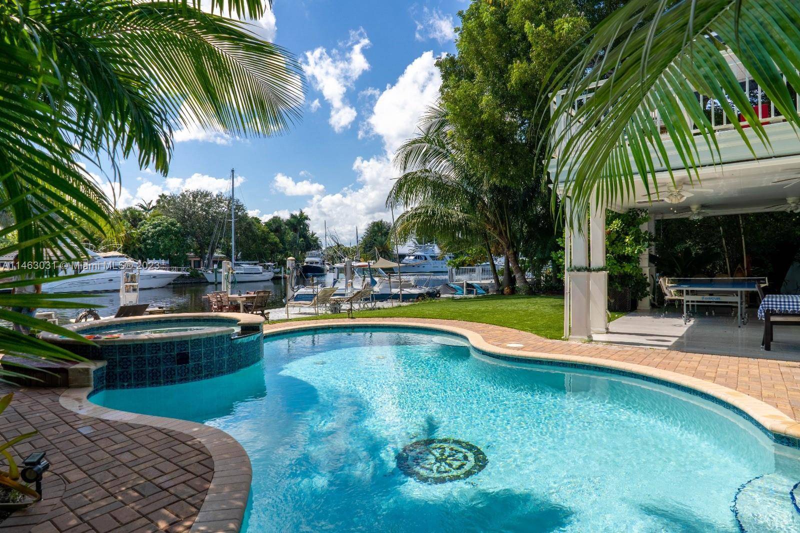 Amazing Intercoastal front 2 floor private home with 95 feet long deck with heated pool and Jacuzzi.
