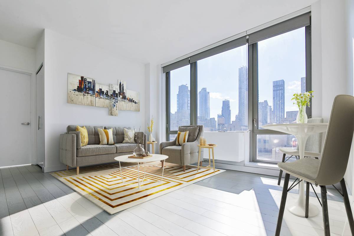 Sun Drenched and Spacious 2 Bedroom in Midtown West | No Fee | Washer/Dryer