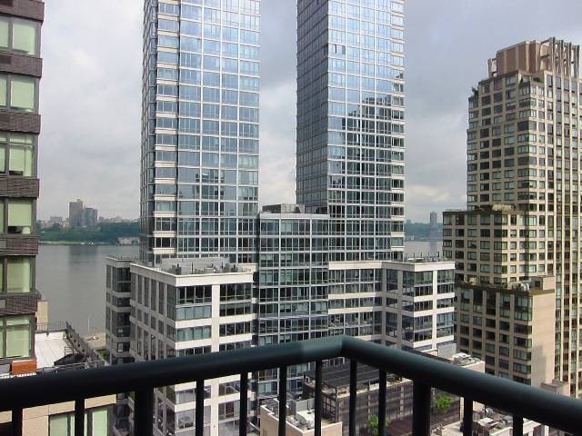 RIVER VIEWS AND MORE IN THIS FLEX/ 3 BED, 2 BATH NEAR LINCOLN CENTER!