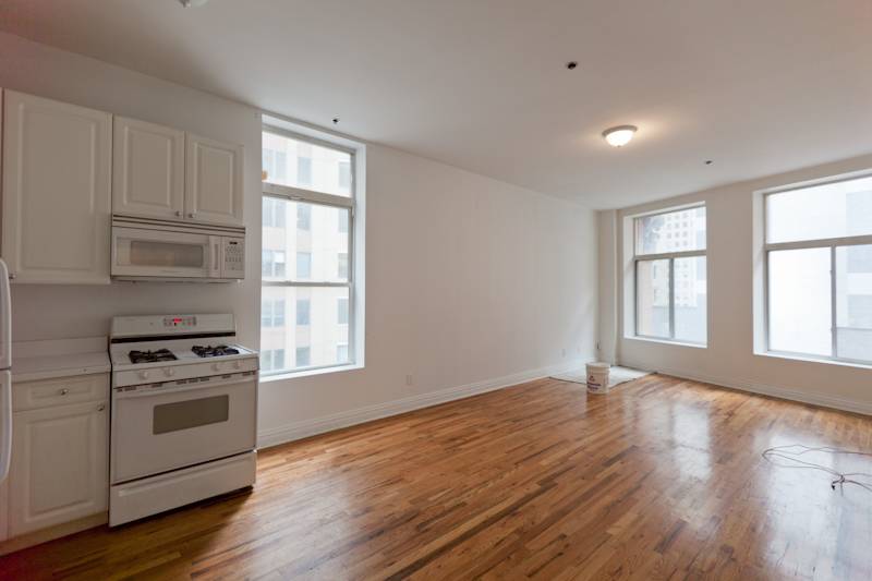NEW-TO-MARKET: 850sqft One-bedroom with Home Office on Maiden Lane