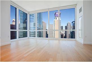 A stunning 1000 SF loft one bedroom  with 1.5 Bath and water view in heart of Midtown West .