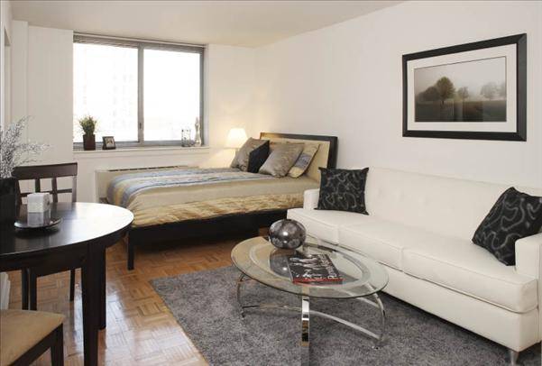 Exclusive Upper East Side Location * Large Studio with Entry Foyer * Garage/Gym/Laundry ** UES
